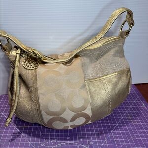 Coach Ali Patchwork gold embossed shoulder hobo bag.